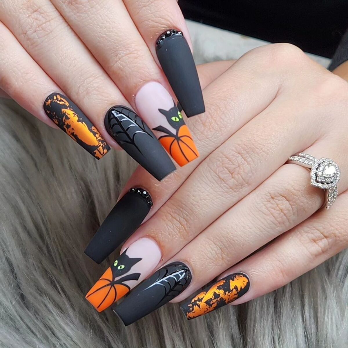 10. Bold Black Cats and Pumpkin Orange Accents