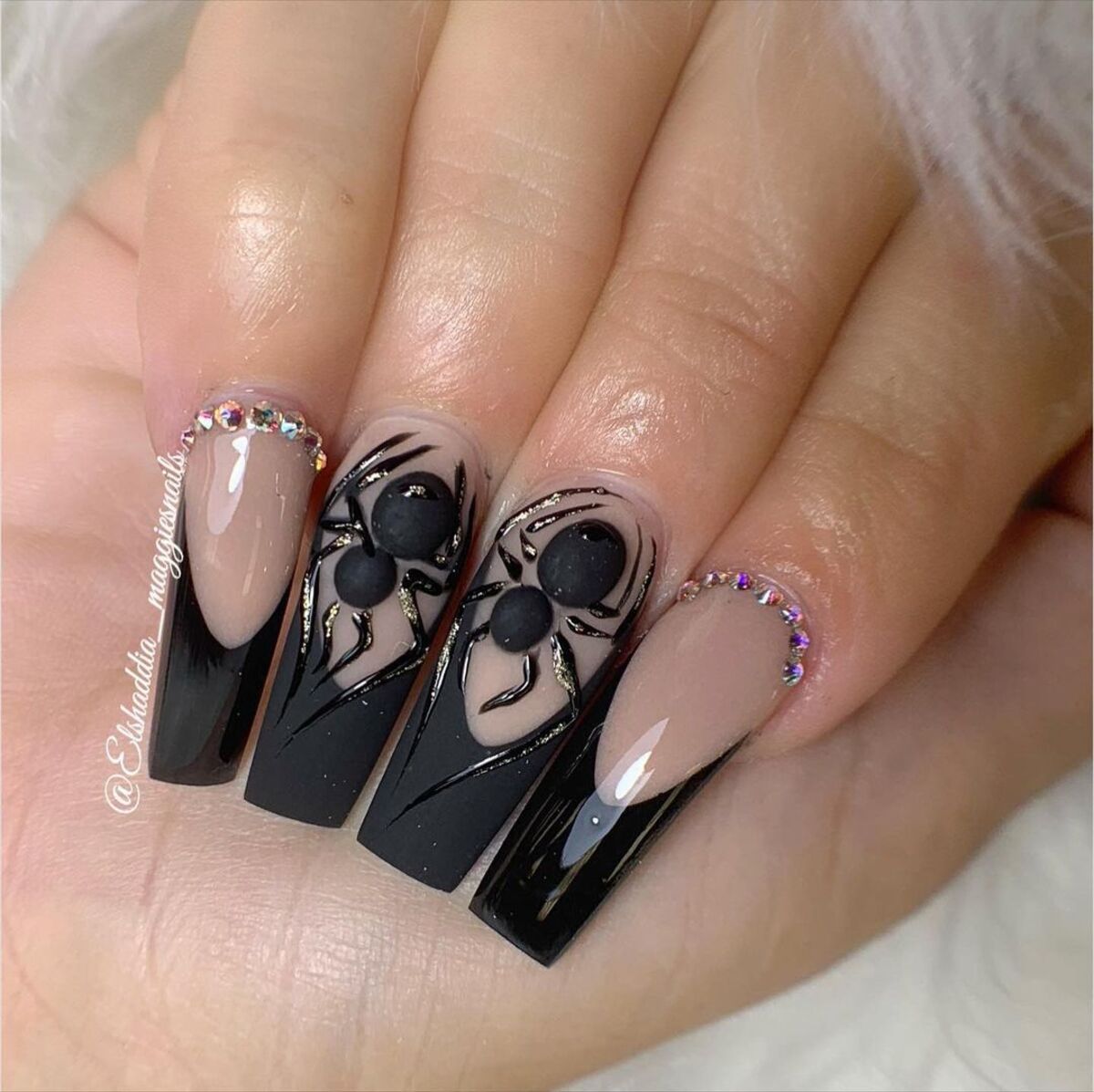 27. Matte Black Spiders with Rhinestone Accents