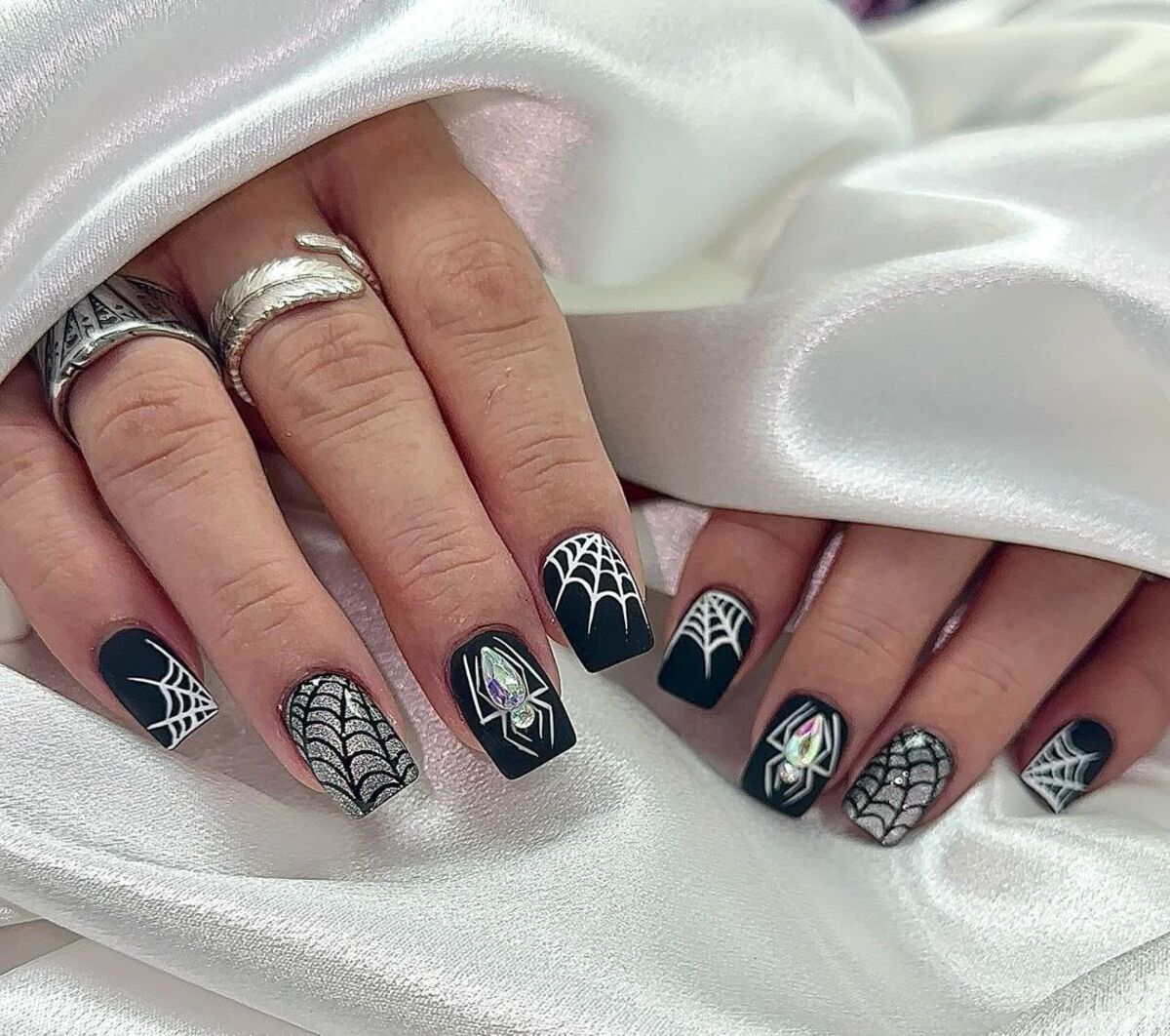 6. Crystal-Covered Spiderwebs on Matte Black