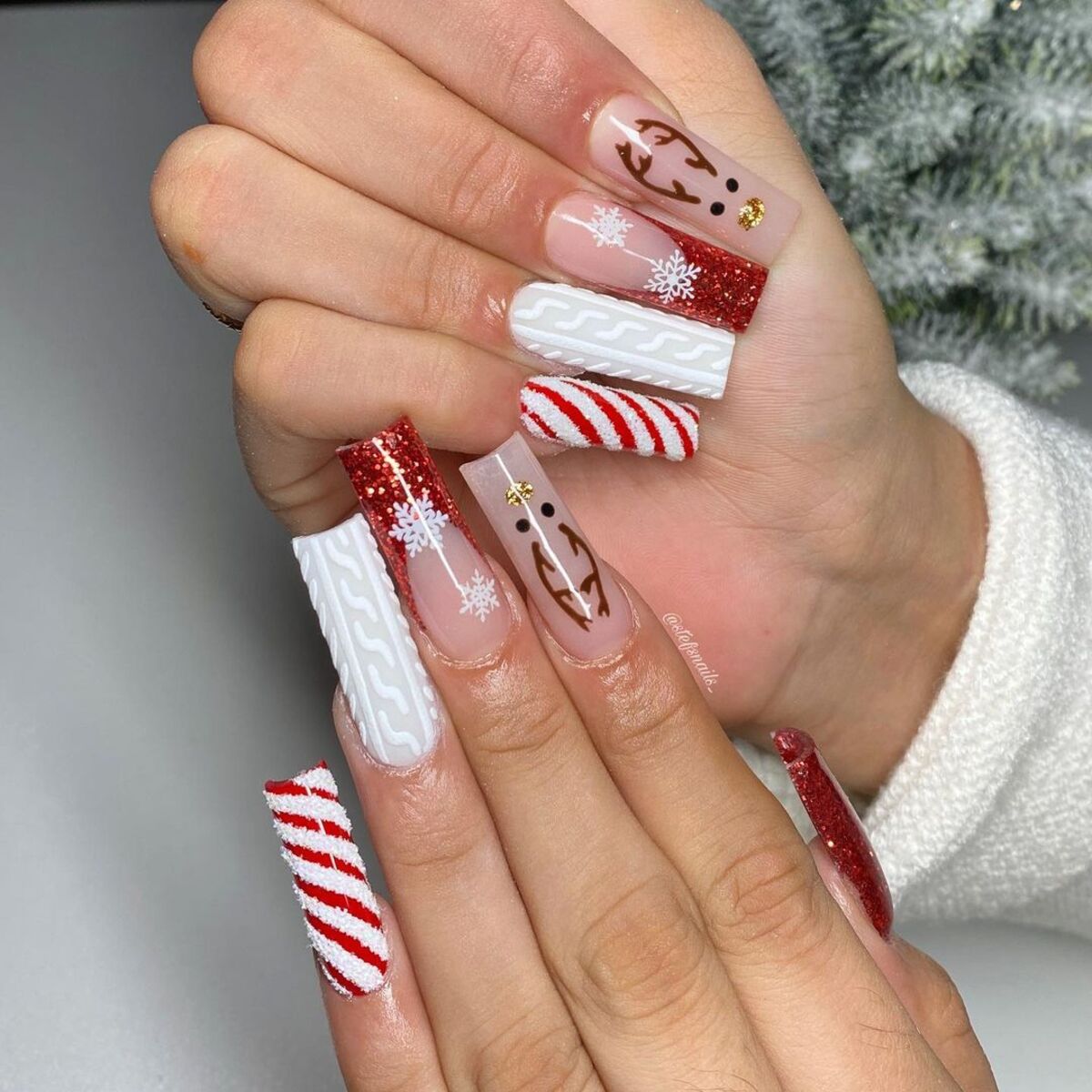 6. Playful Reindeer and Candy Cane Stripes