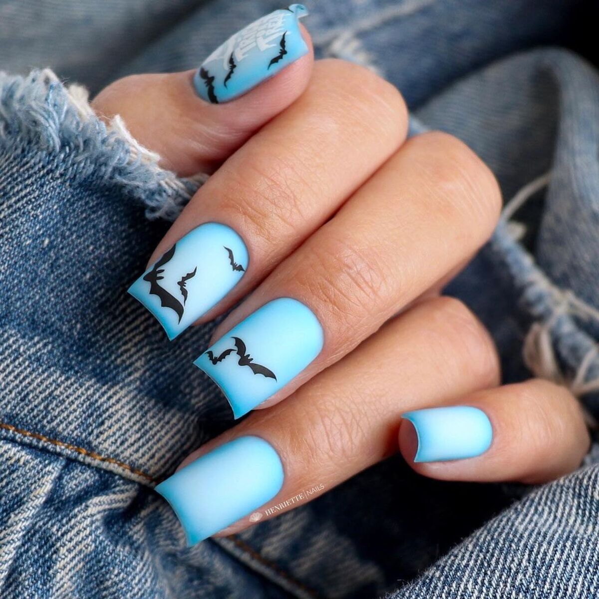 26. Sky Blue Nails with Flying Bats