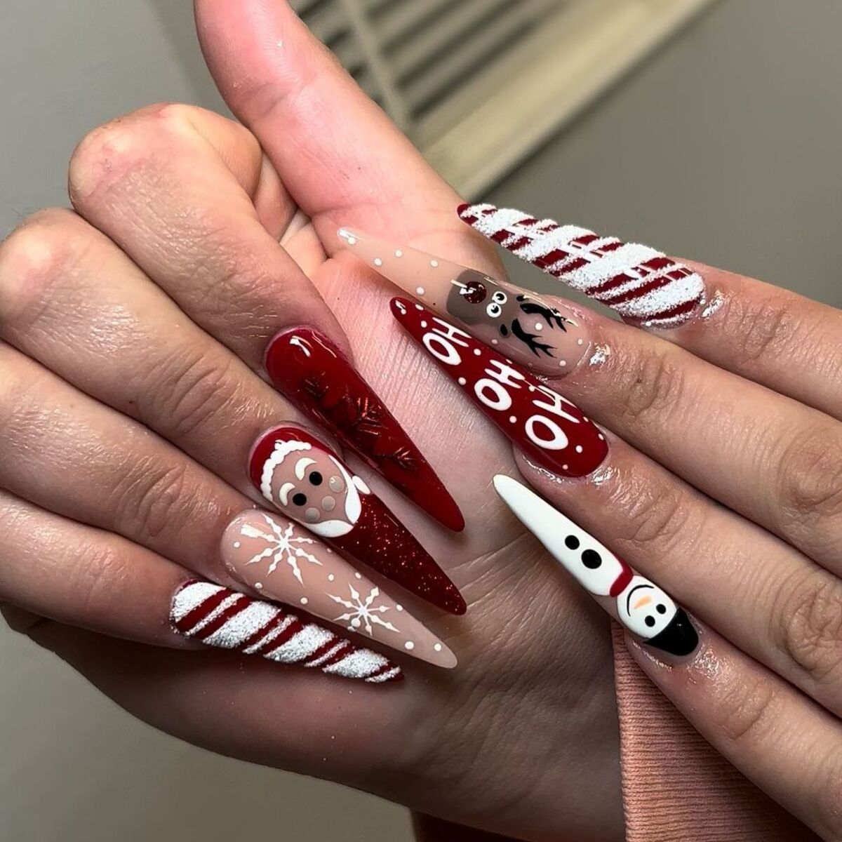 10. Whimsical Christmas Characters on Long Nails