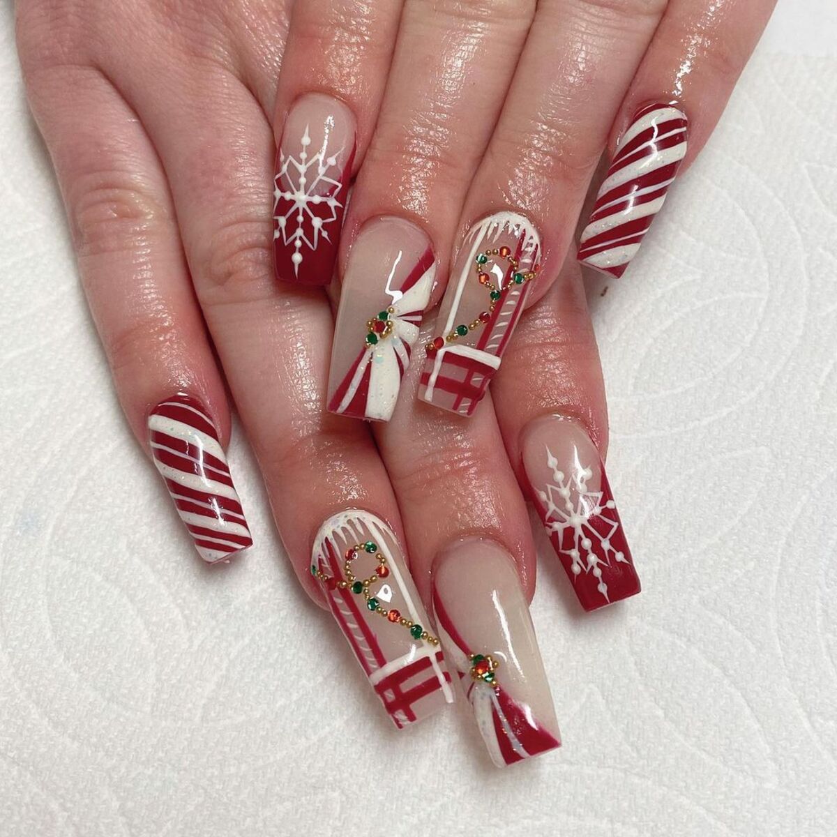 15. Red and White Christmas Gift Nails