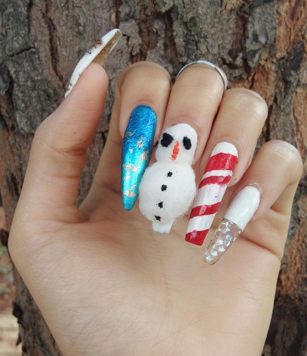 5. Playful Snowman and Candy Cane Design