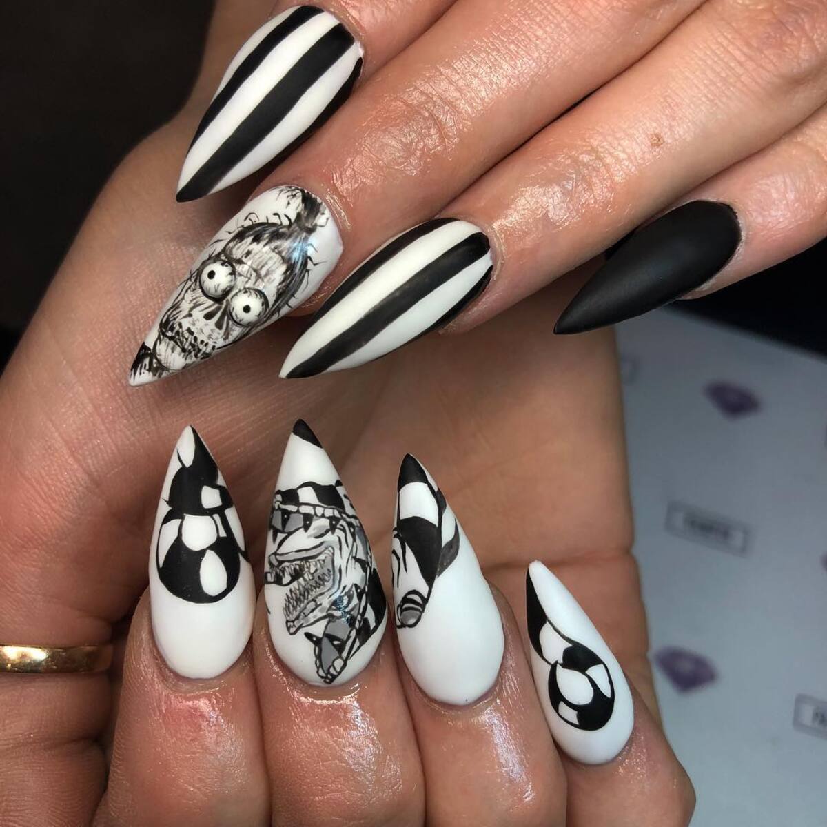 16. Scream-Inspired Nail Art