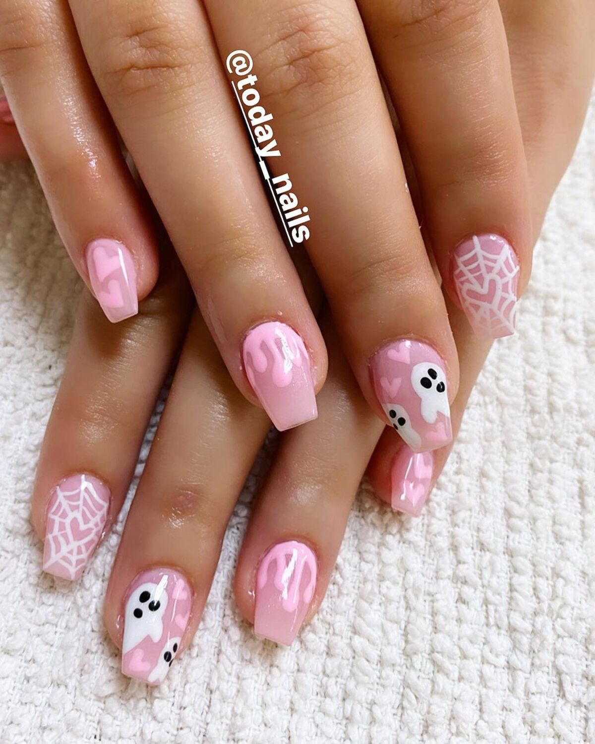 19. Chic Pink and Black Halloween Nails