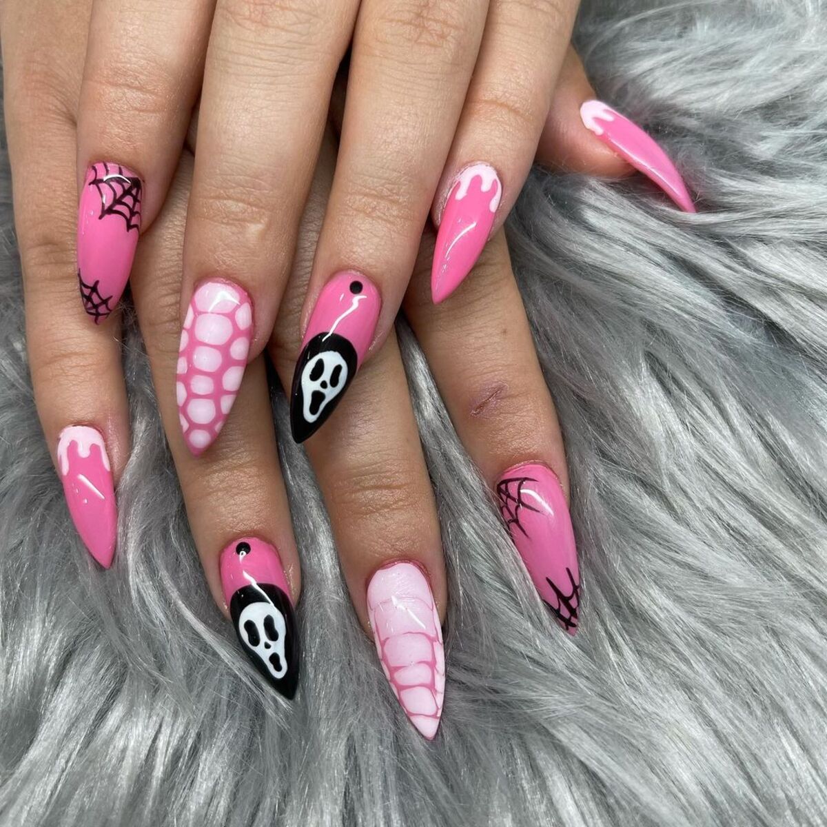 25. Spooky Pink Sculpted Nails