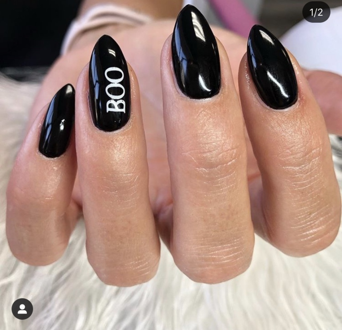 23. Sleek Black with a Spooky Message