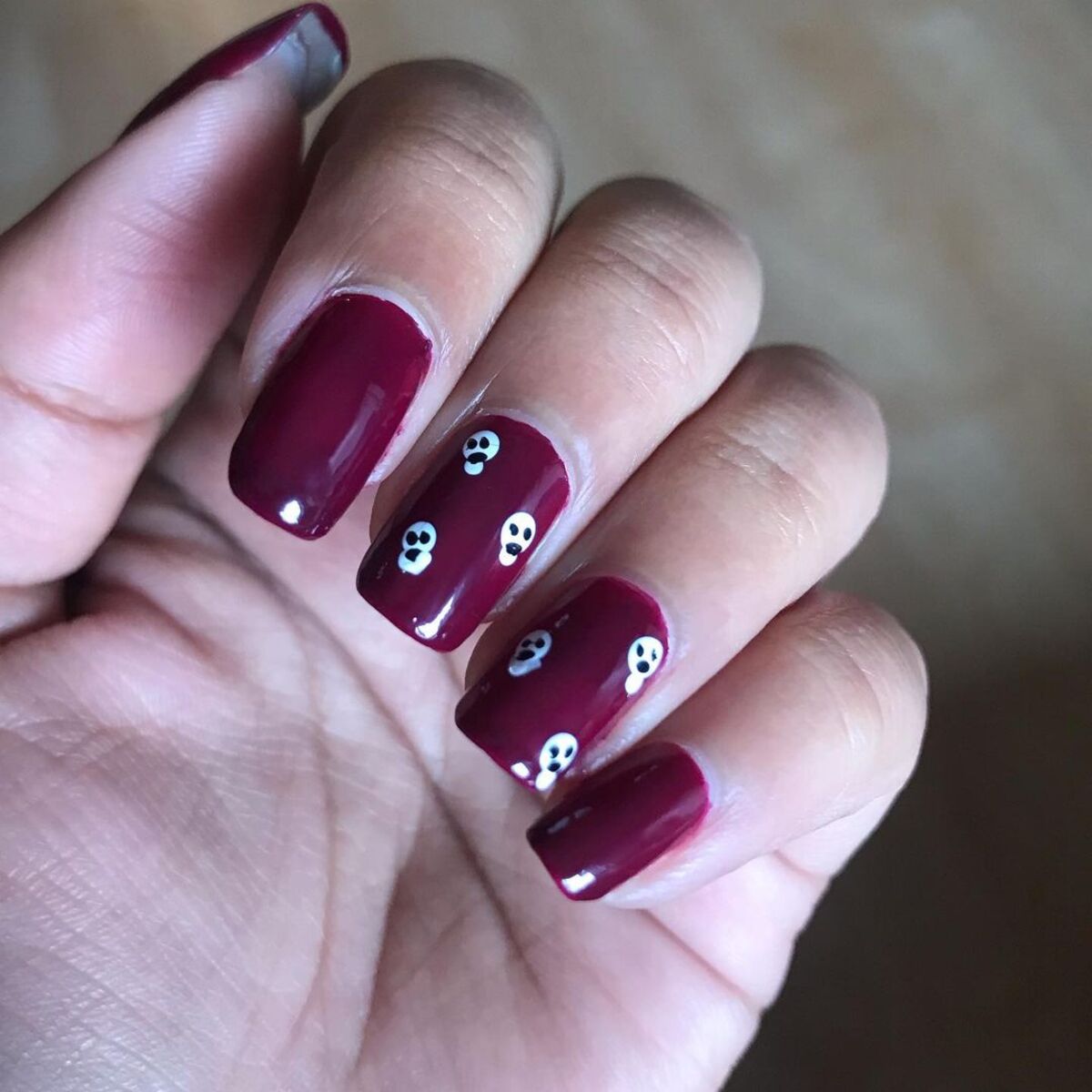 27. Burgundy Skulls