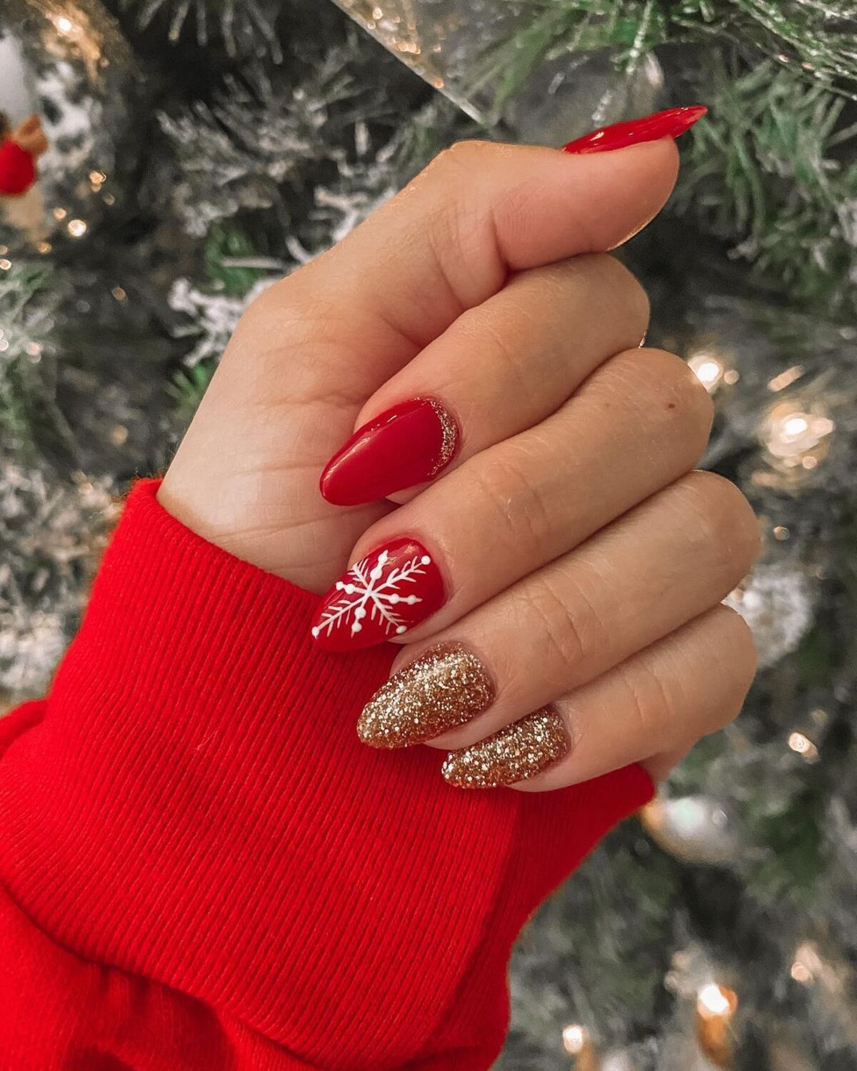 10. Glittering Gold and Red Holiday Nails