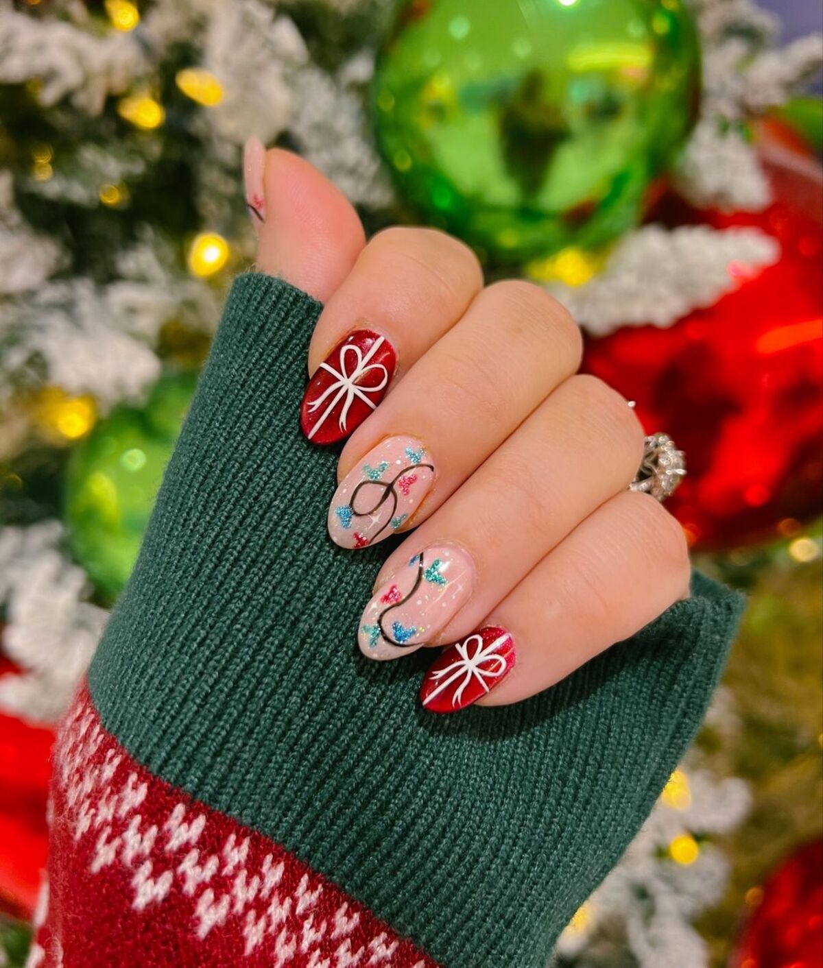 17. Festive Green and Red Glitter Nails