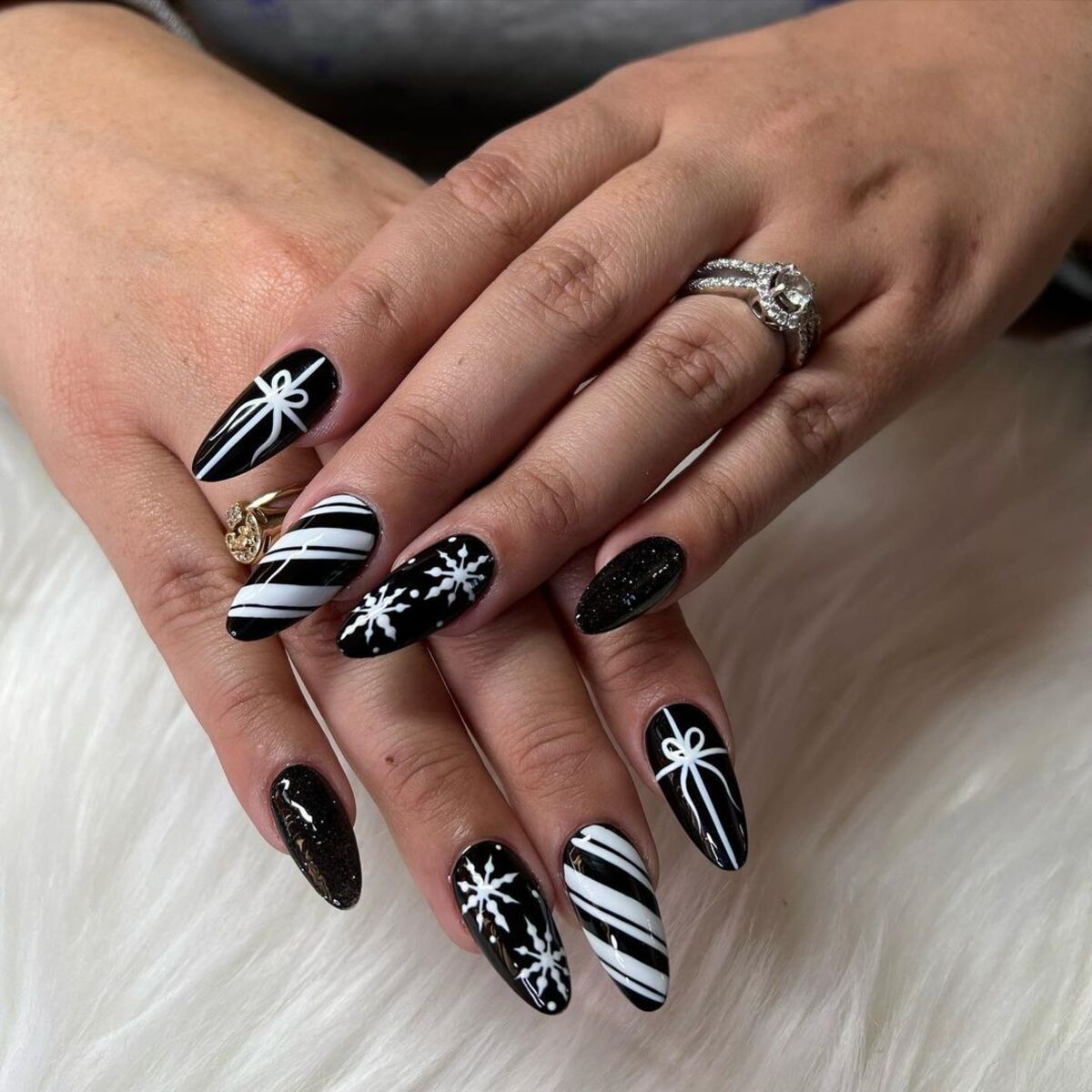 4. Chic Black and White Christmas Nails