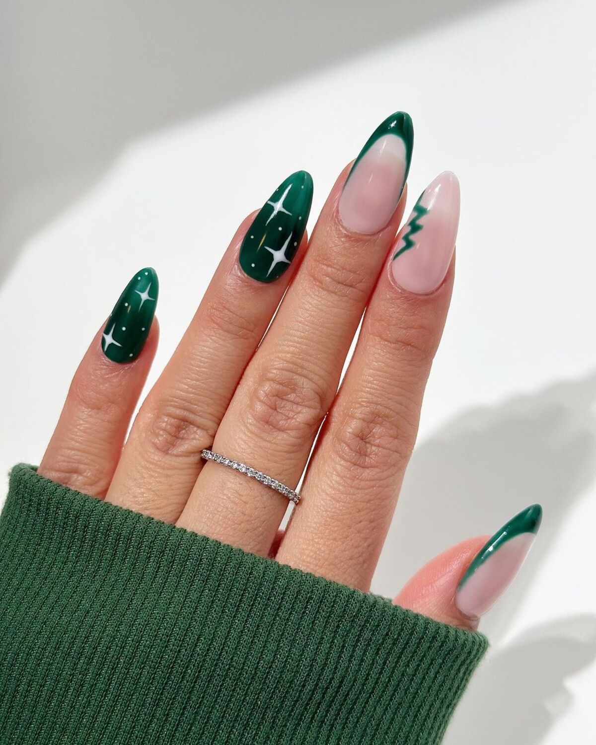 19. Sleek Evergreen with Christmas Tree Accent