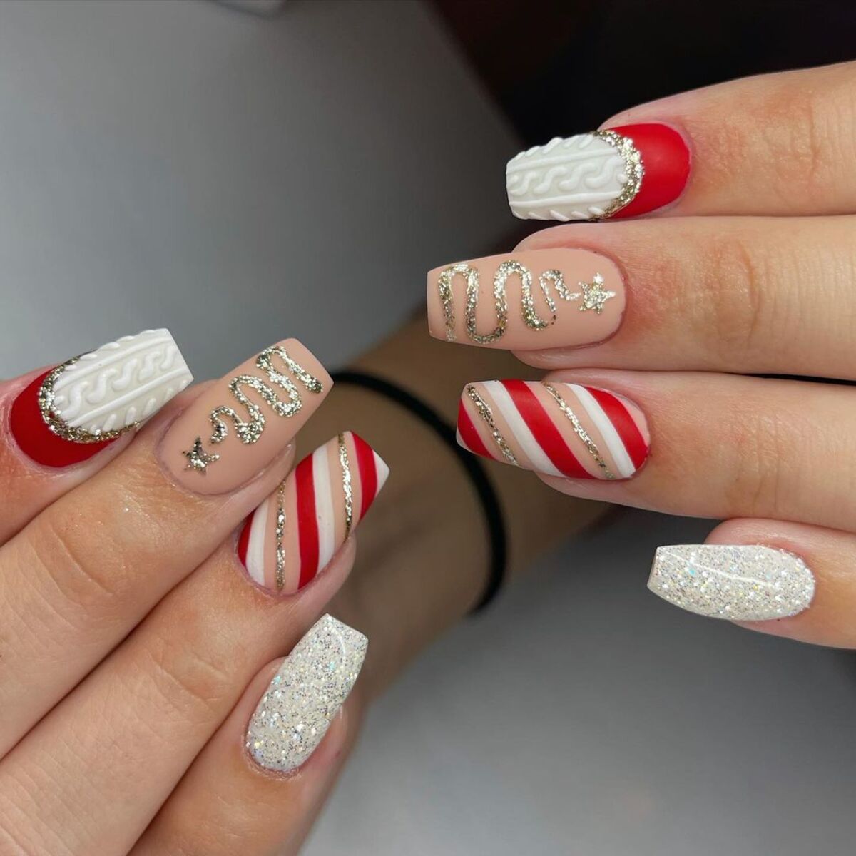 12. Candy Cane Stripes and Glittery Glam Nails