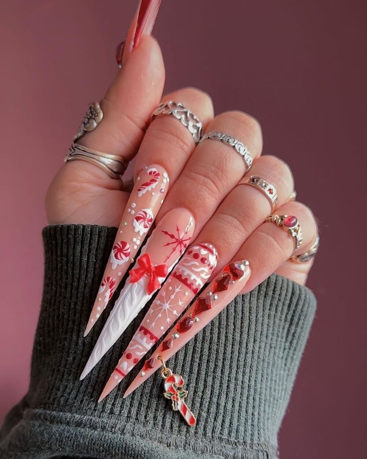 13. Festive Candy Cane and Winter Wonderland Nails