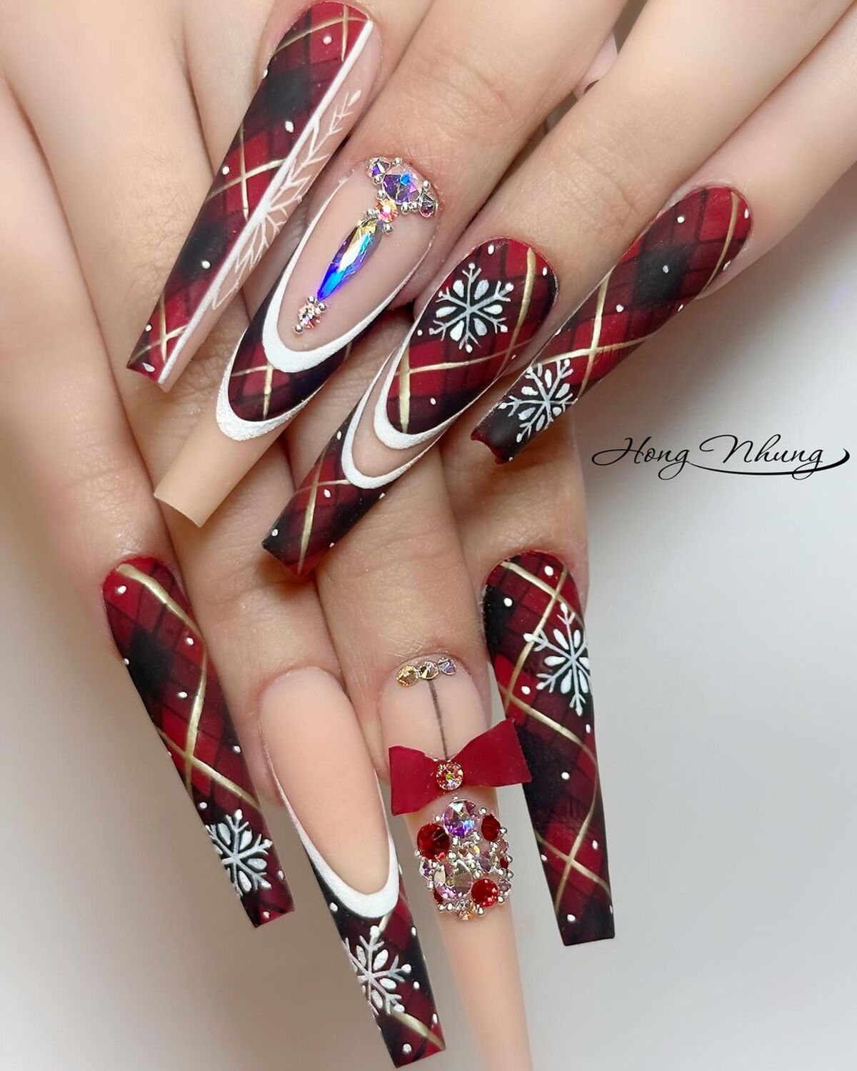 15. Elegant Plaid and Jewel-Embellished Nails