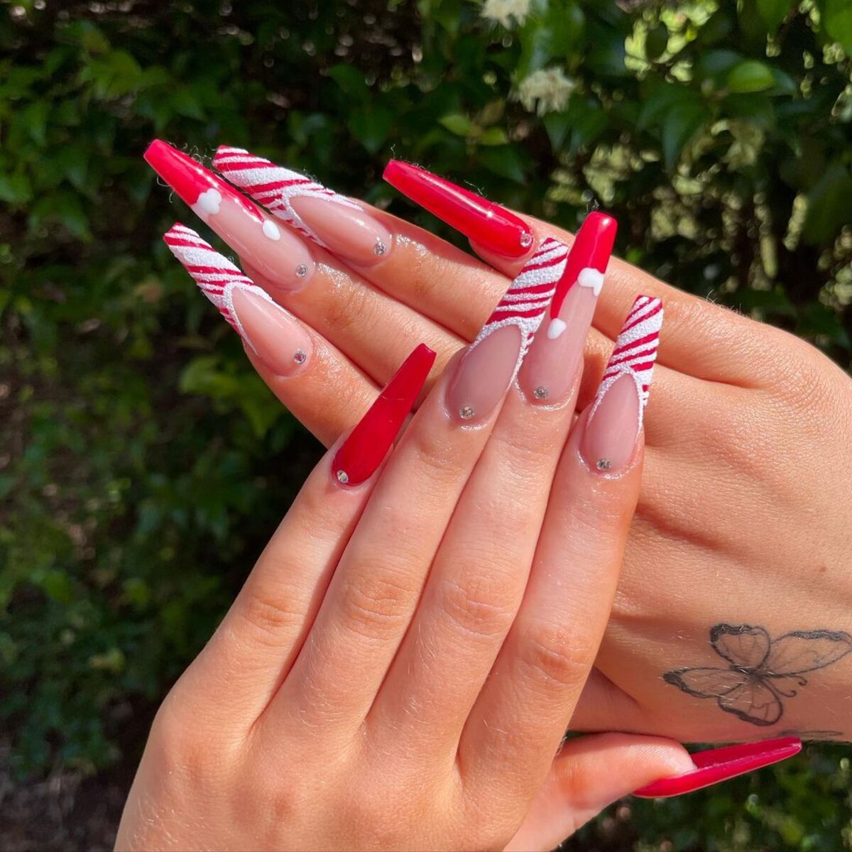 17. Candy Cane-Inspired French Tips