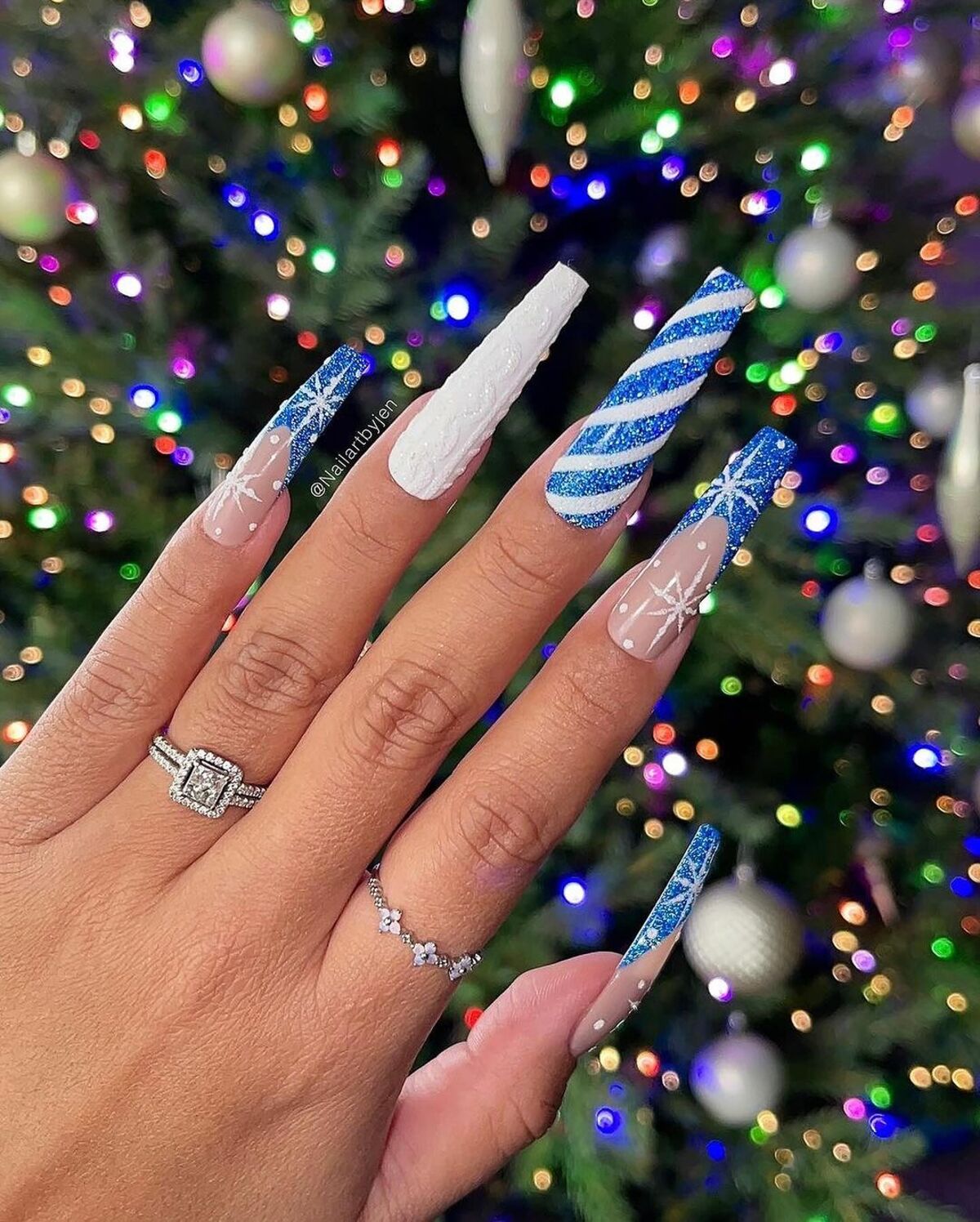 5. Frosty Blue and Snowflake Nails