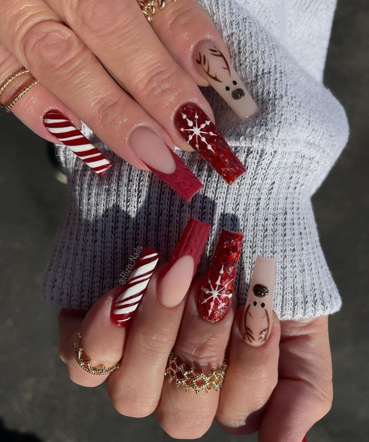 6. Reindeer and Candy Cane Combo Nails