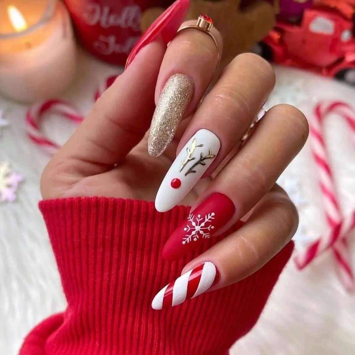 9. Gold Reindeer and Snowflake Nails