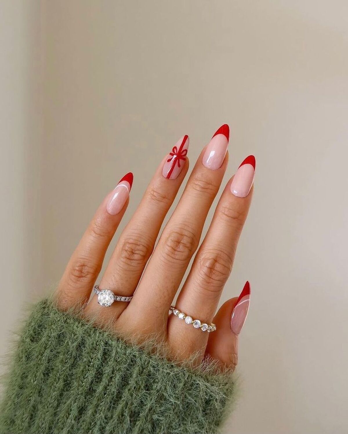 17. Classic Red French Tips with Gift Bow Accent