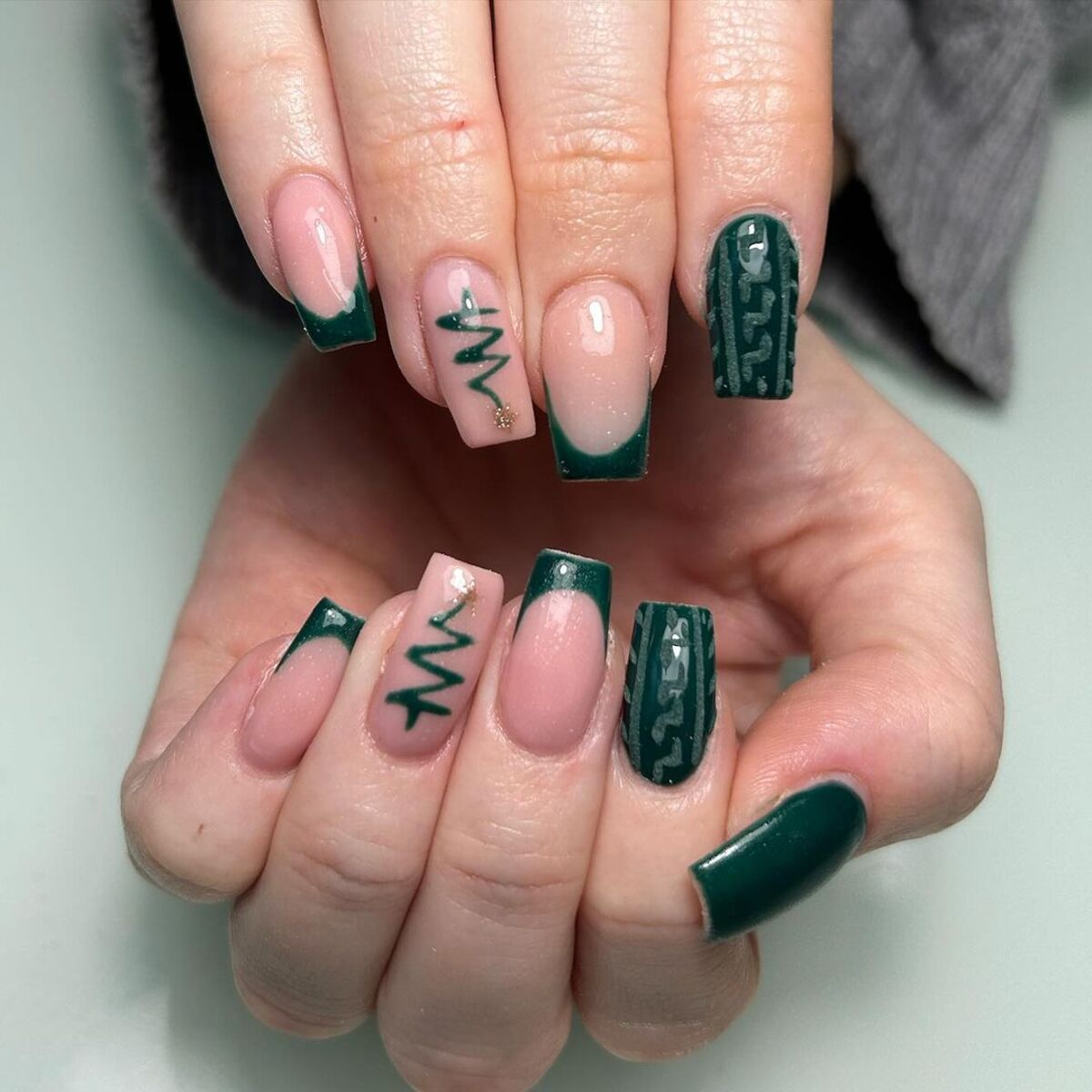 2. Elegant Green French Tips with Christmas Tree Art