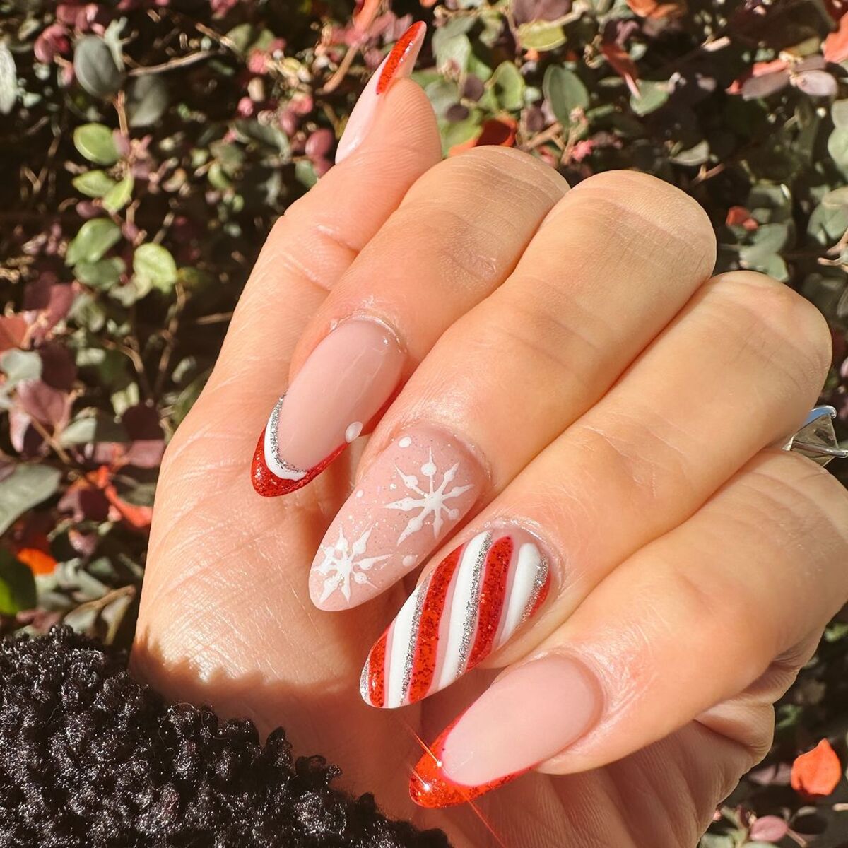 9. Elegant Red and White Candy Cane Stripes with Snowflakes