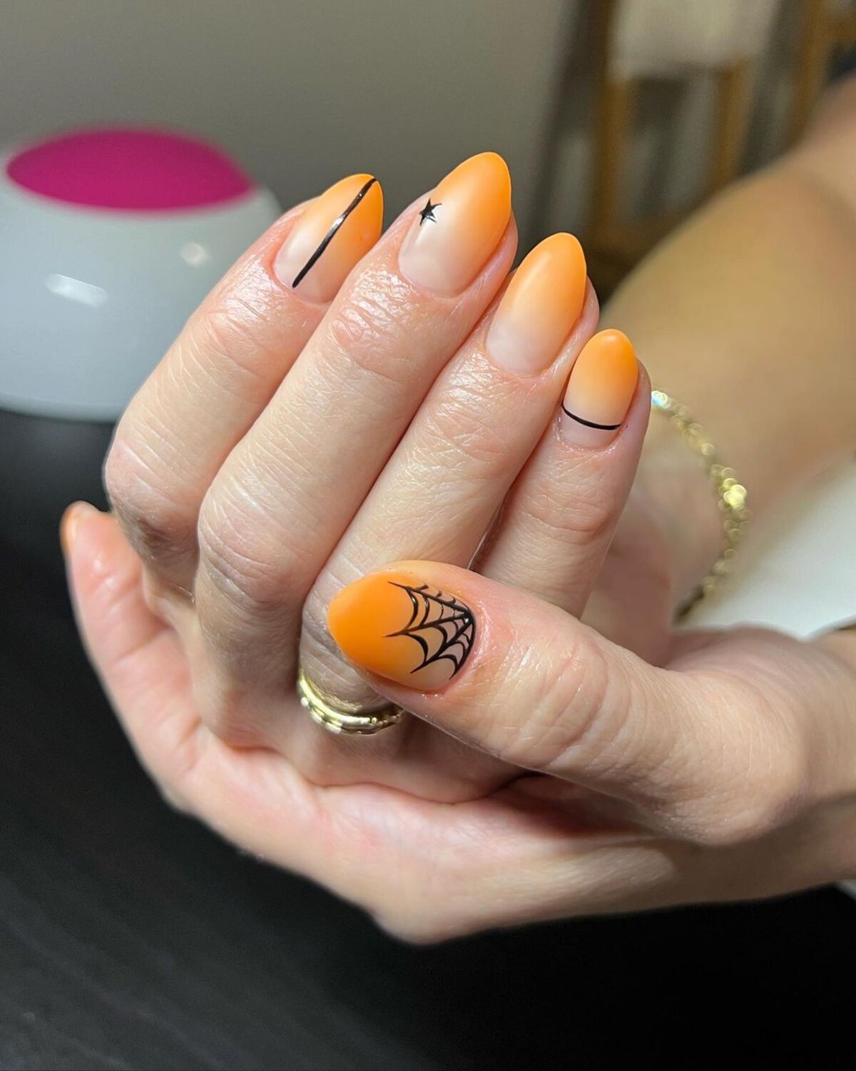 18. Orange Ombre with Spider Web Accent