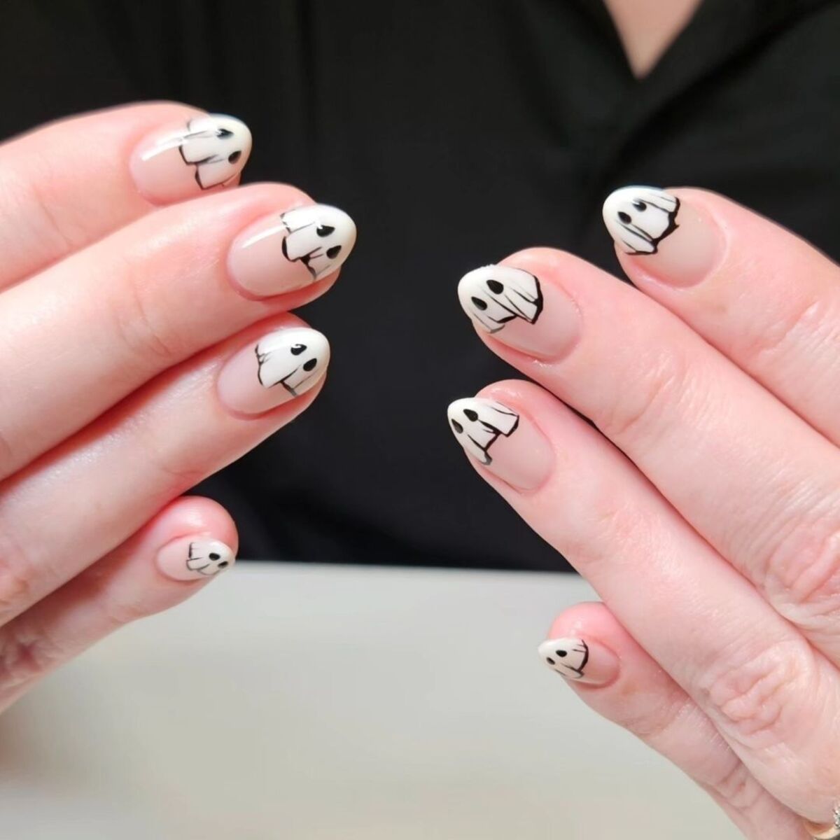 7. Floating Ghosts on Nude Nails