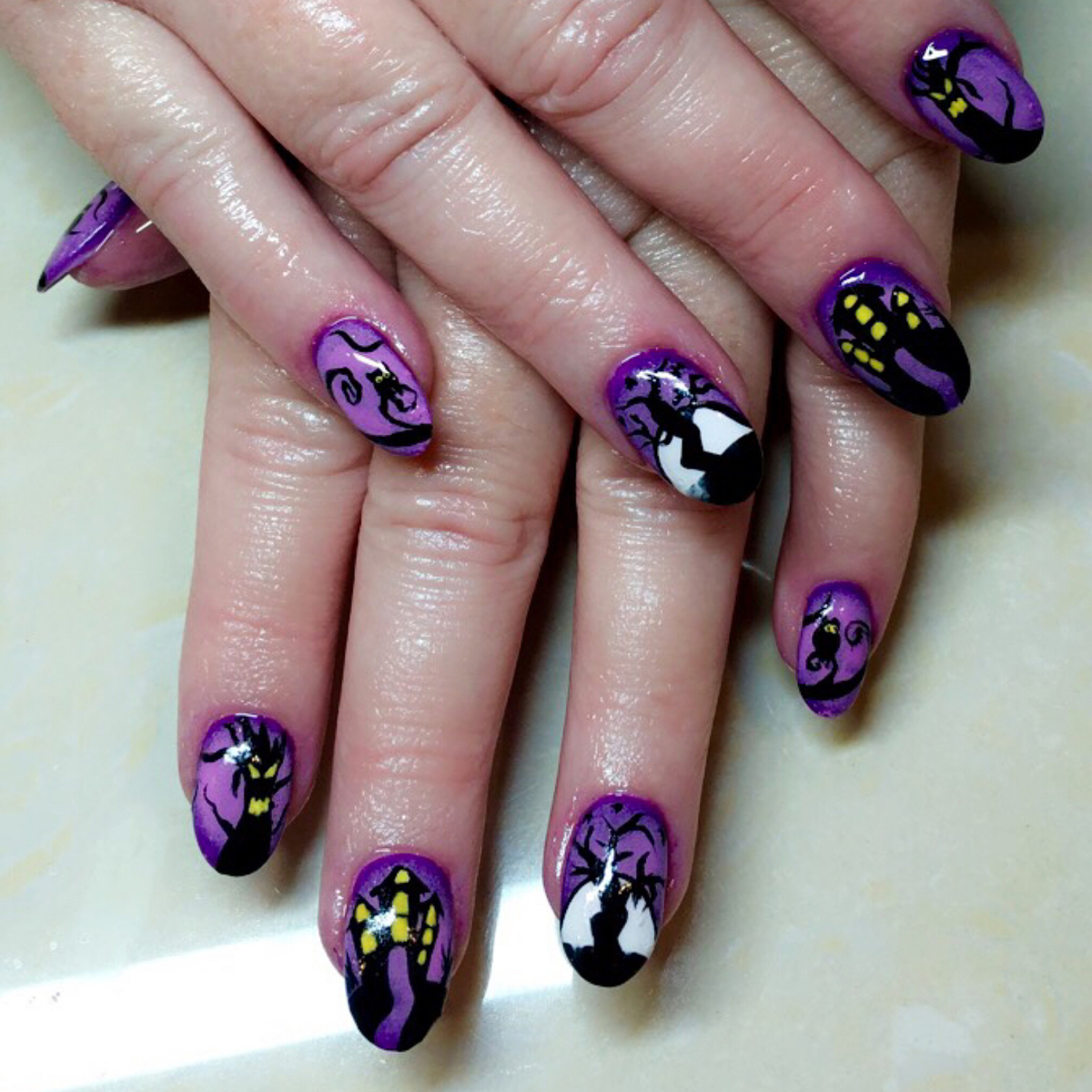 11. Haunted Purple Nights Nail Art