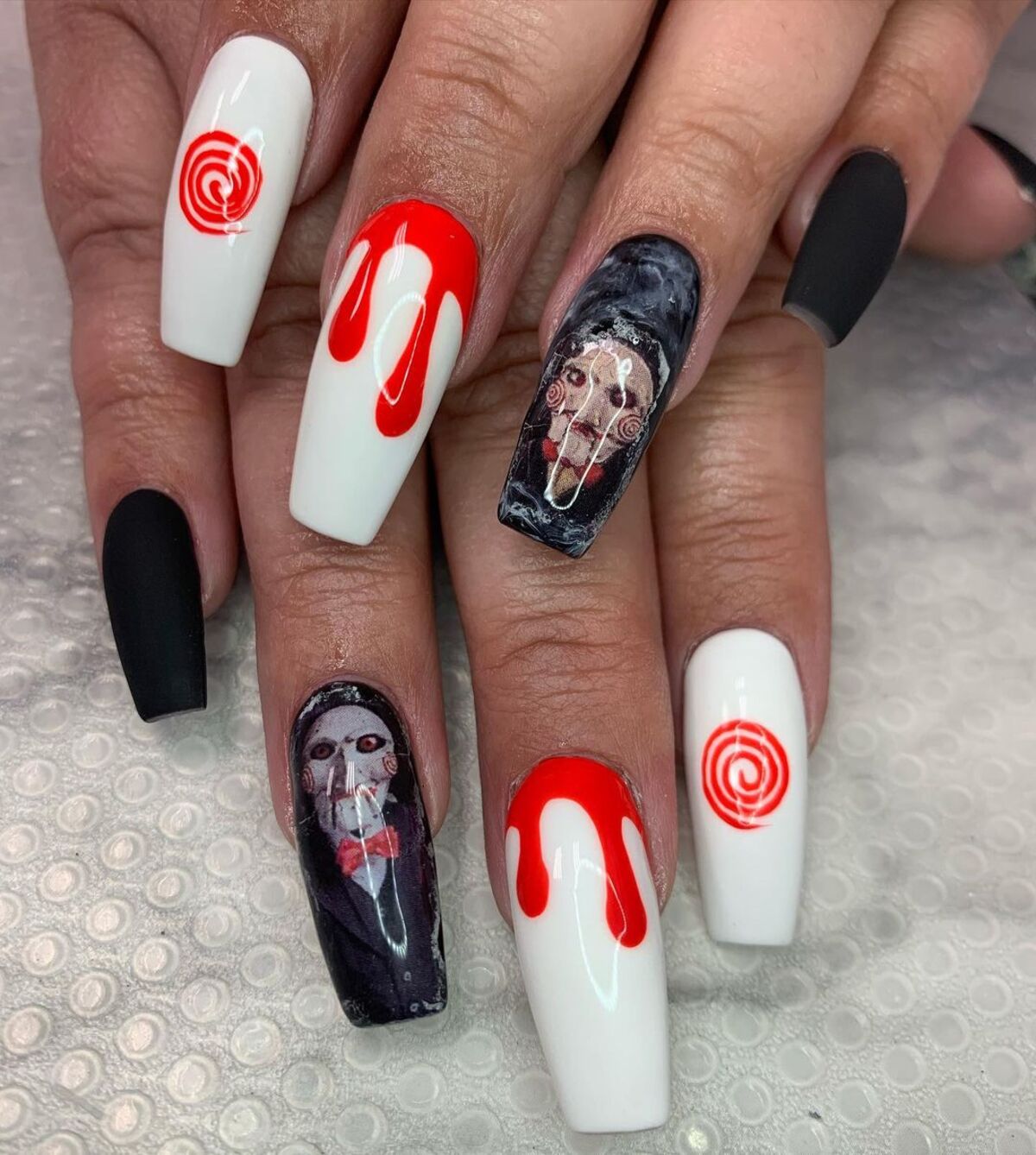 18. Saw-Inspired Horror Nails