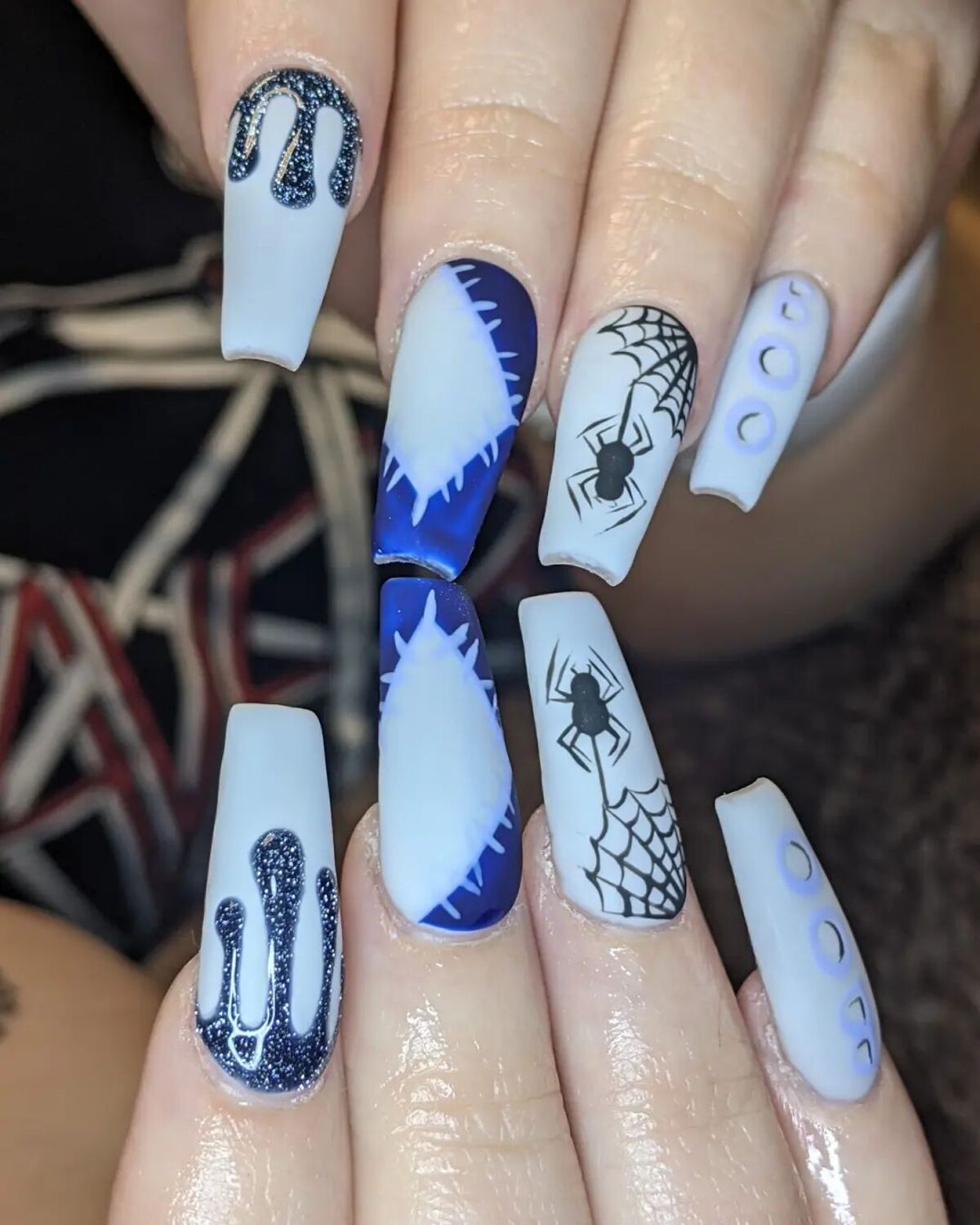 31. Chilling Blue and White Halloween Nails