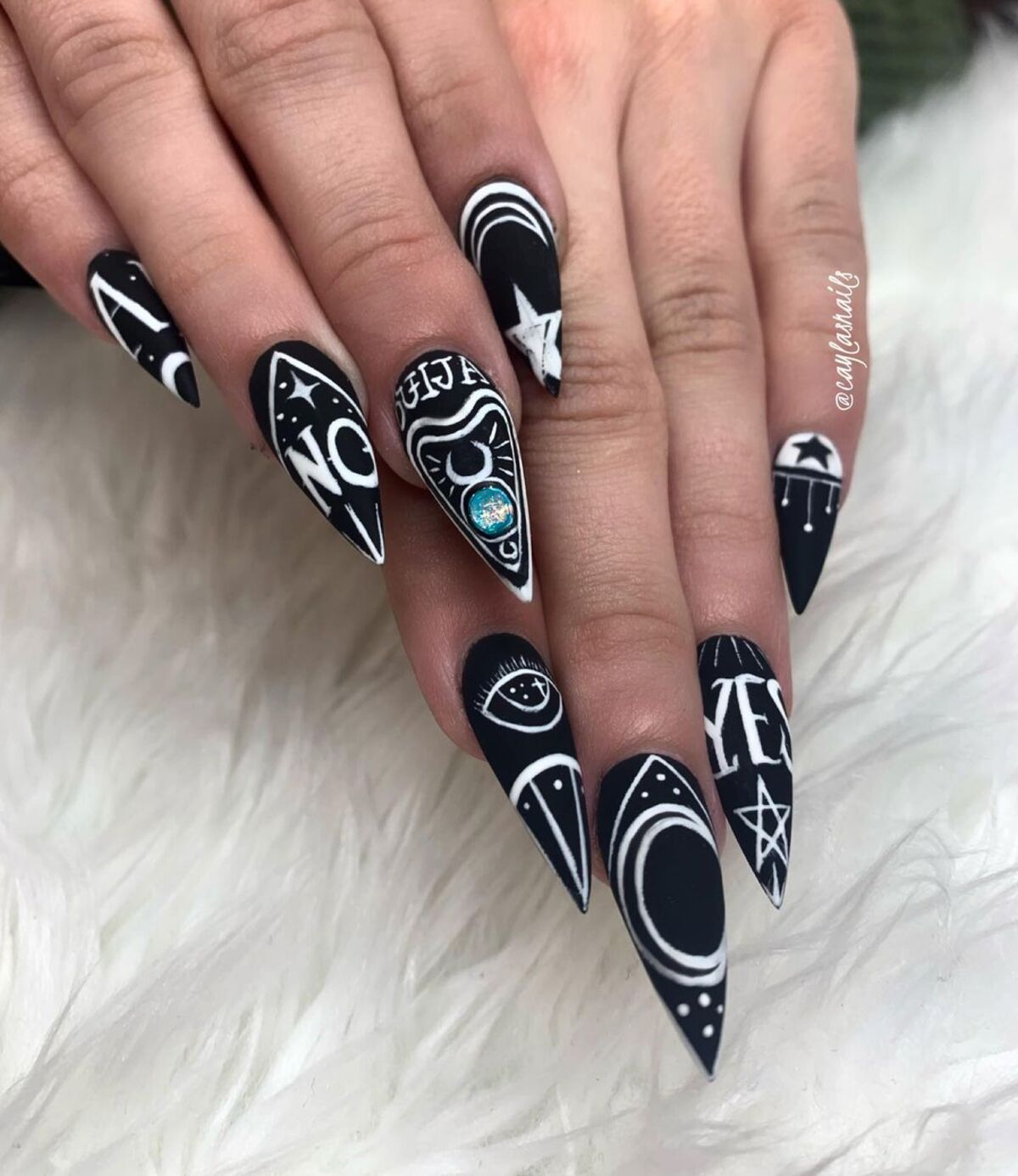 6. Ouija Board Inspired Nails