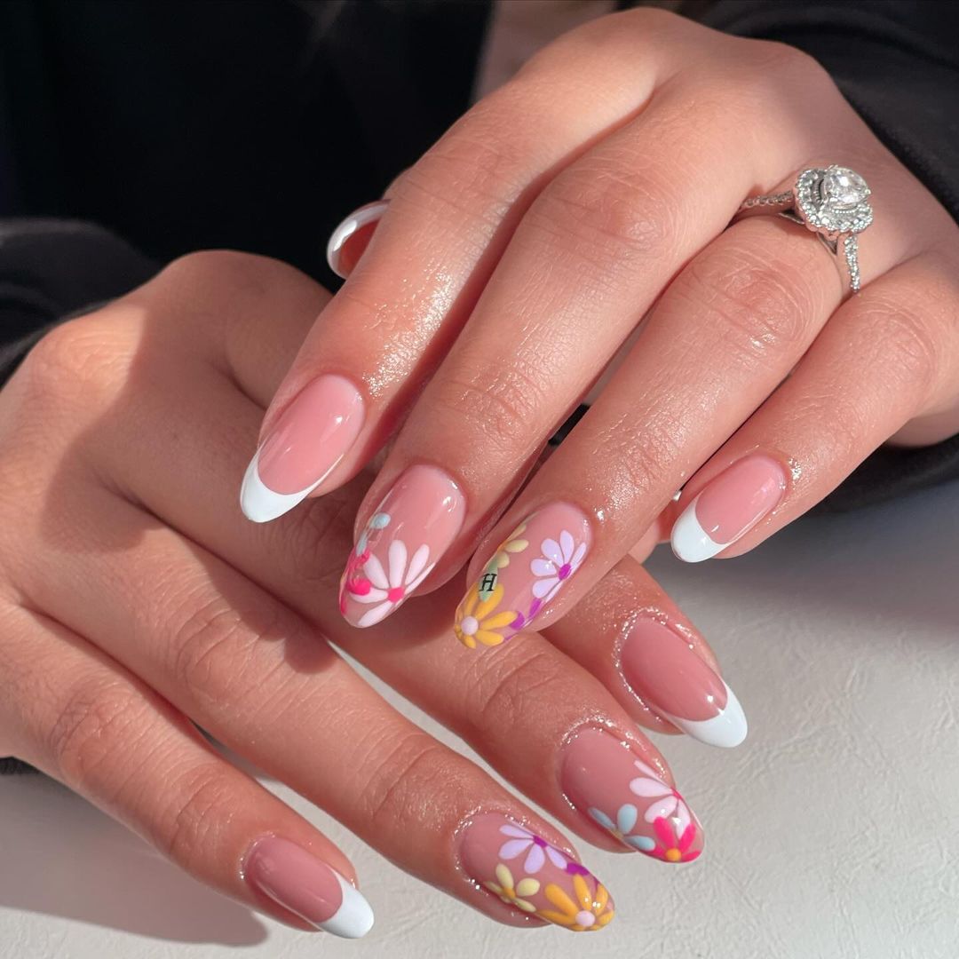 18. Floral French Tips with a Twist