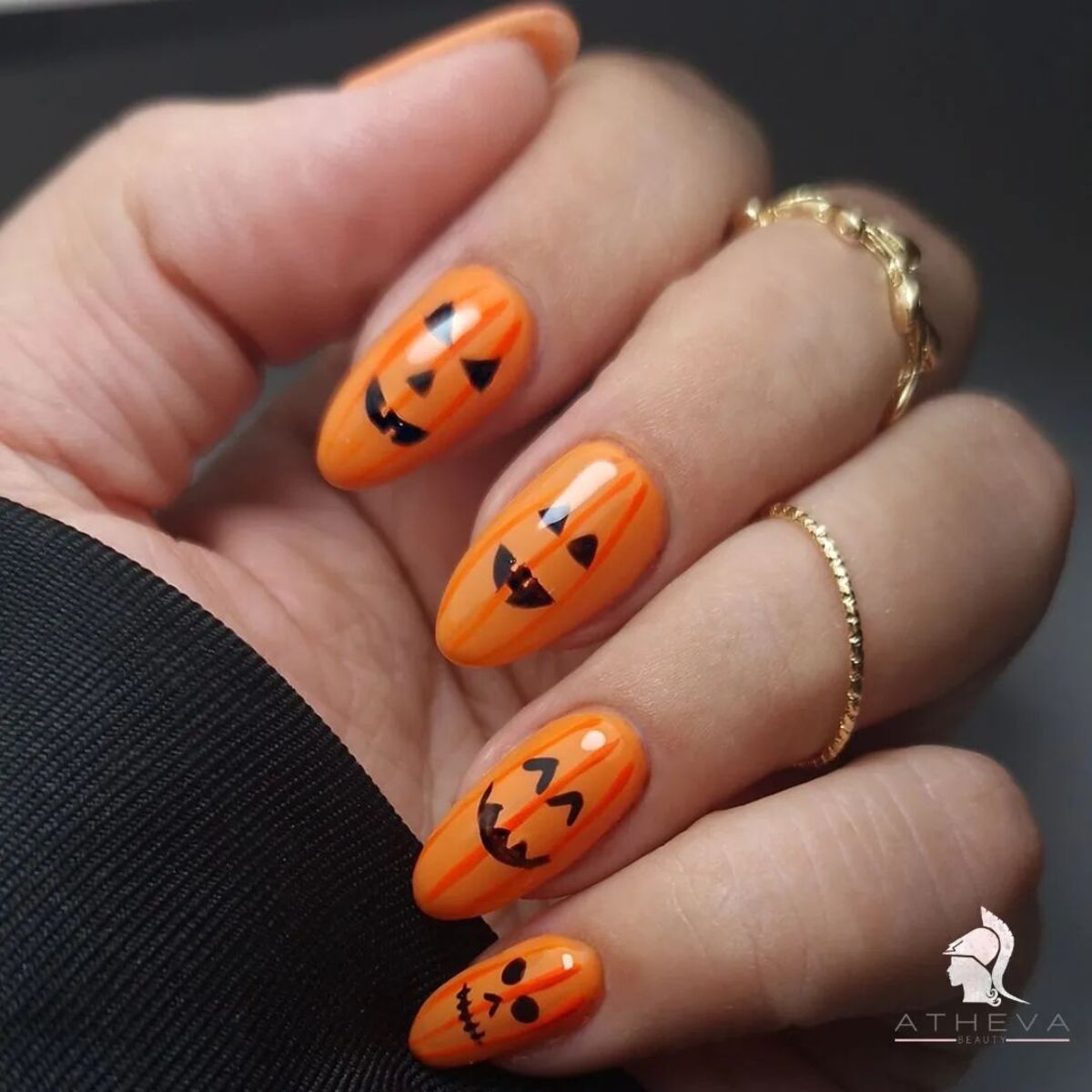 28. Smiling Jack-O’-Lantern Nails