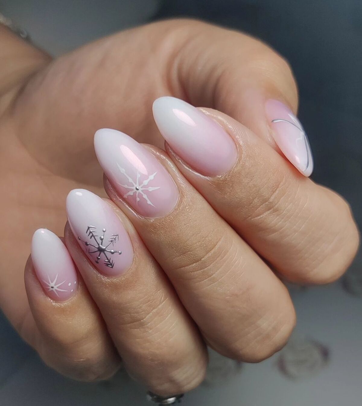 17. Subtle Pink and White Ombre with Snowflake Motifs