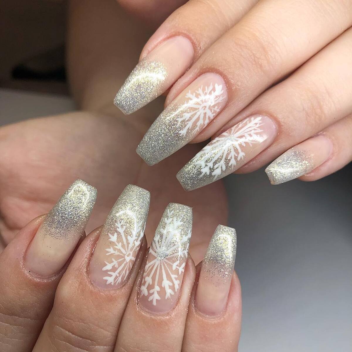 25. Silver Glitter Ombre with Bold Snowflake Art