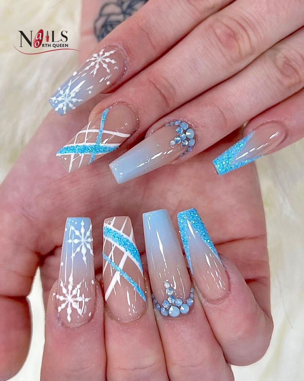 4. Blue and White Ombre with Snowflakes and Glitter