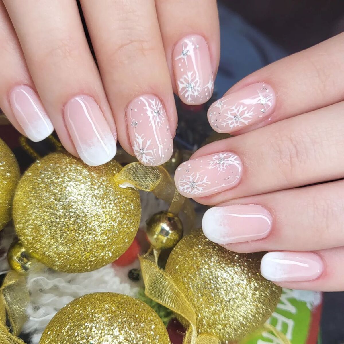 6. Delicate Pink Ombre with White Snowflake Details