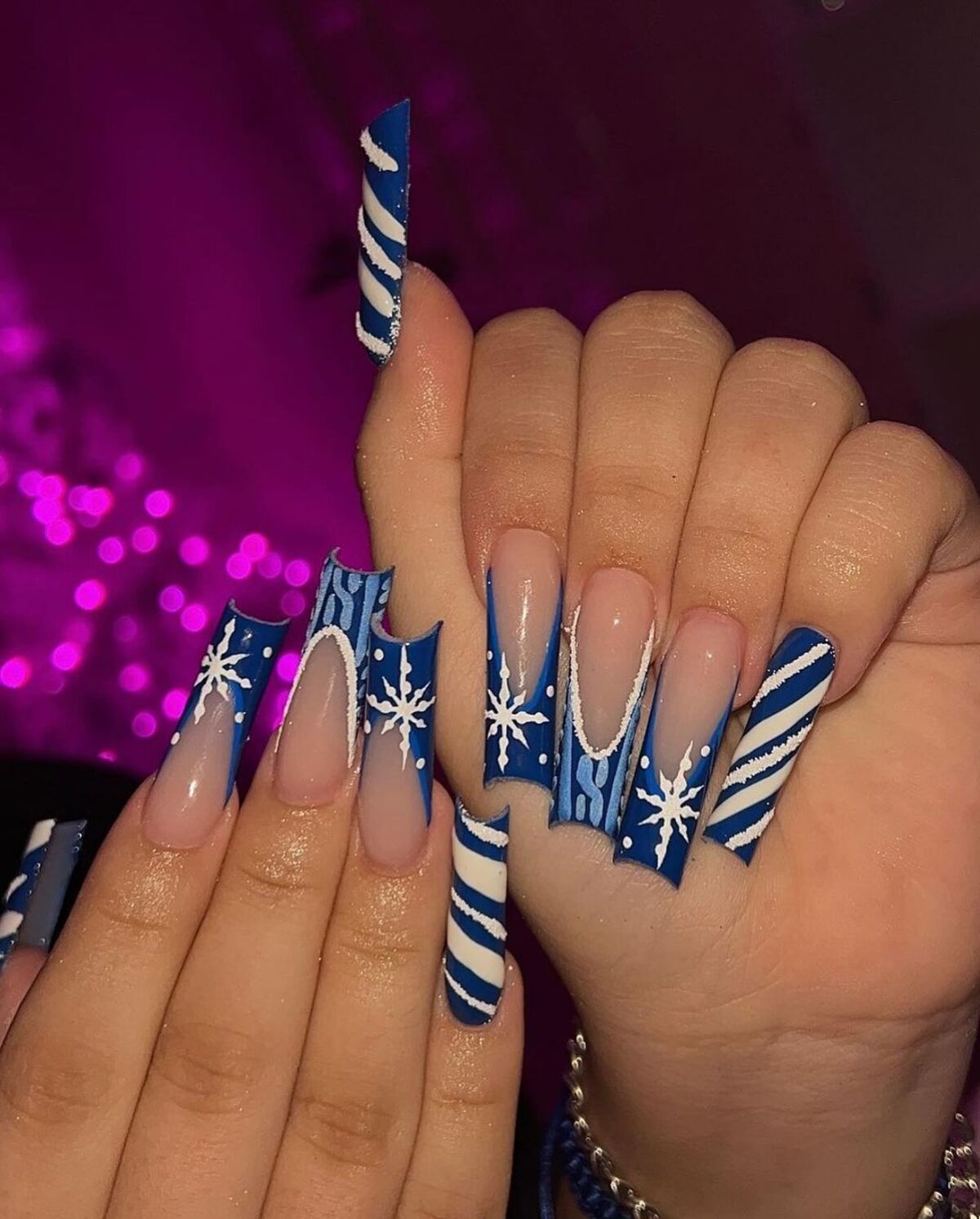 2. Frosty Blue Coffin Nails with Snowflakes