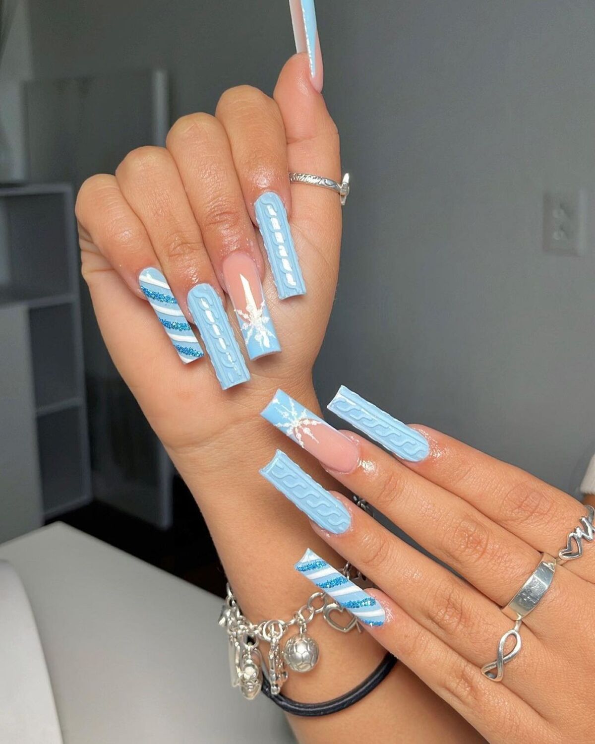 4. Baby Blue Sweater-Inspired Coffin Nails