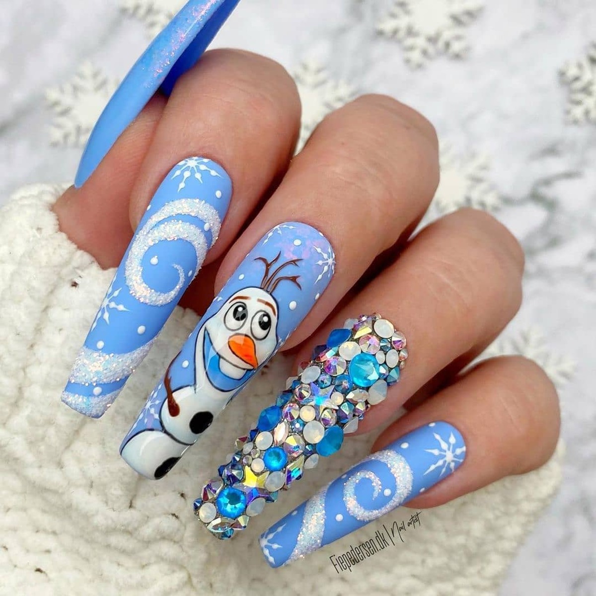 8. Frosted Olaf-Themed Nails with Gem Accents