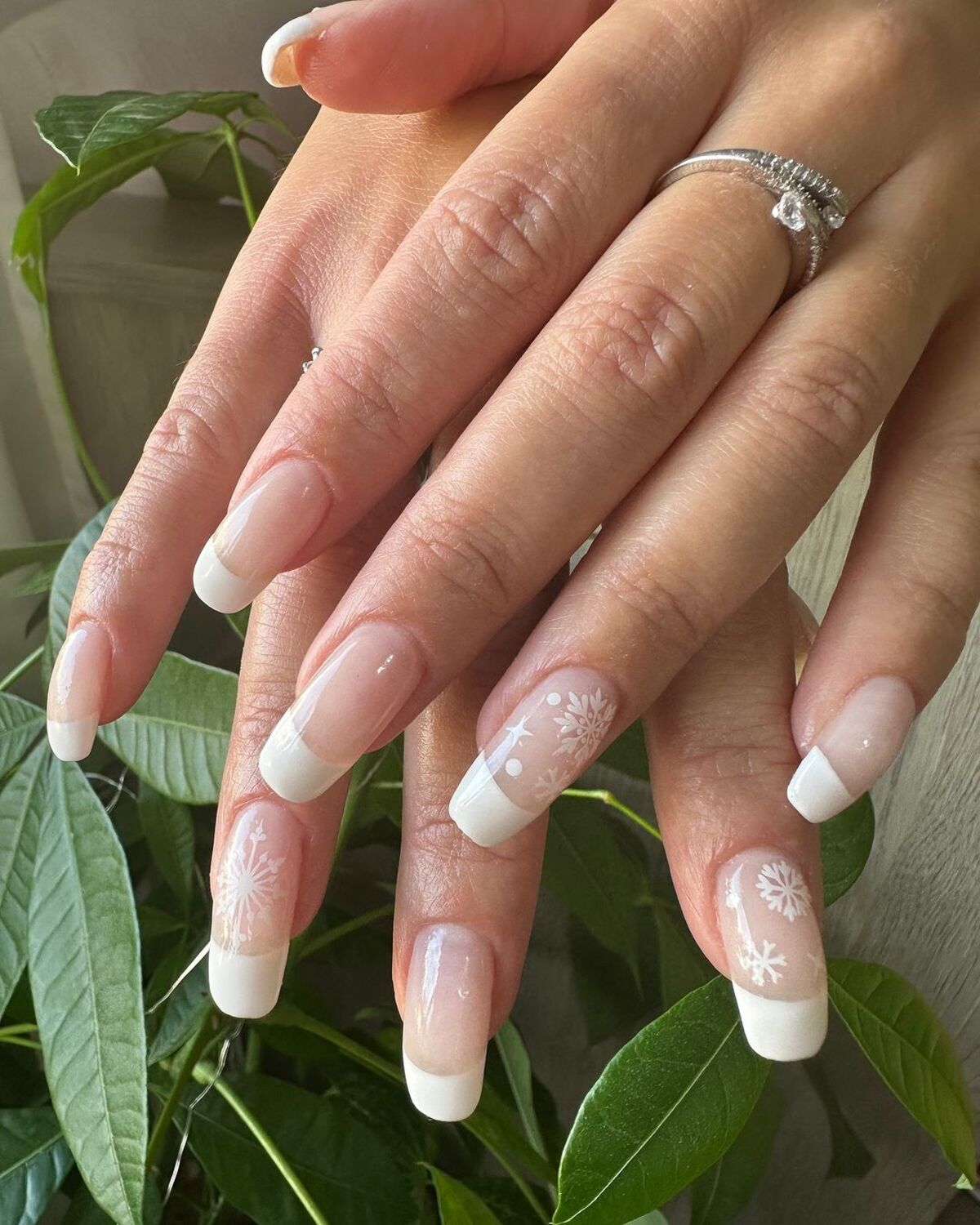 15. Classic White Tips with Snowflake Details