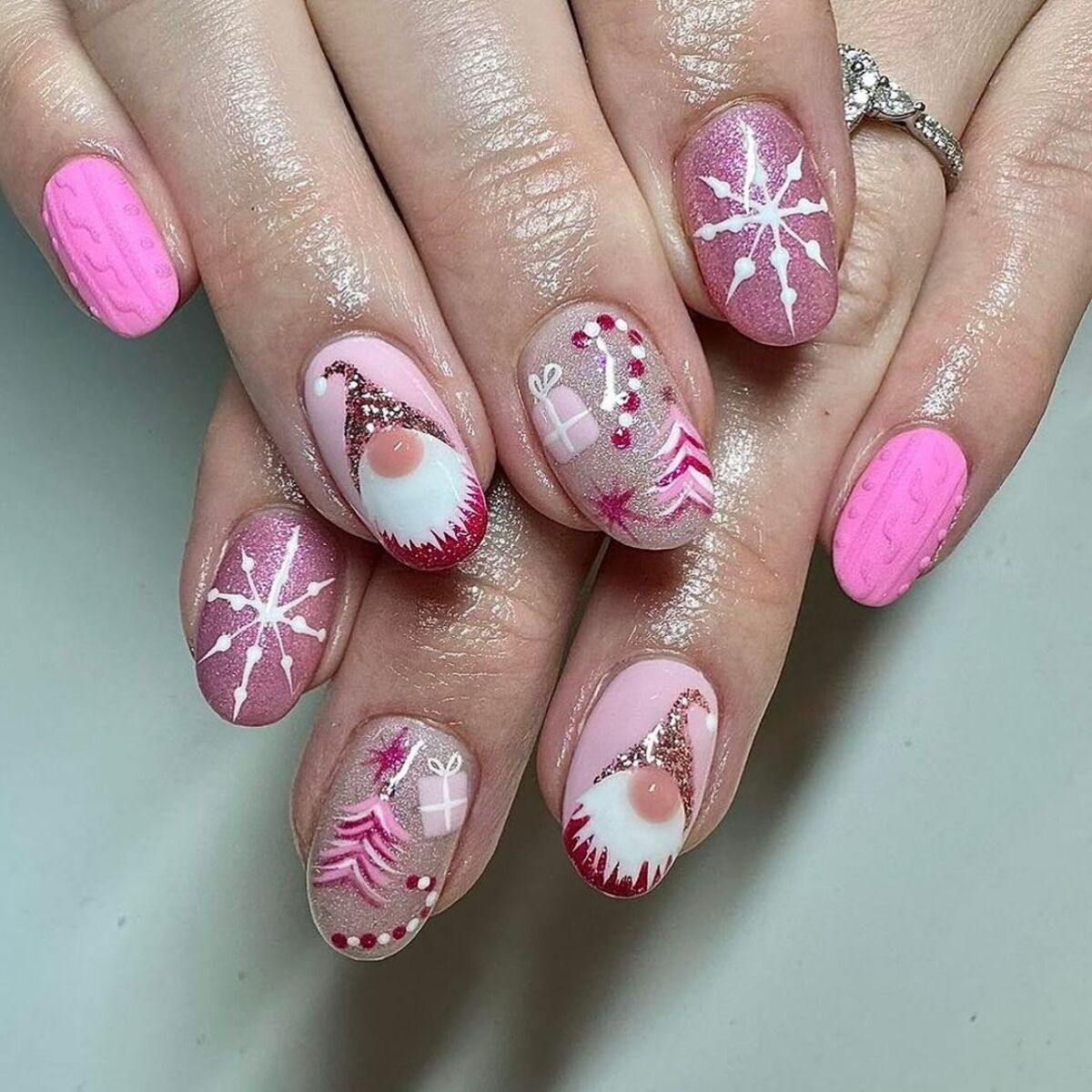 1. Whimsical Pink Christmas Gnome Nail Art