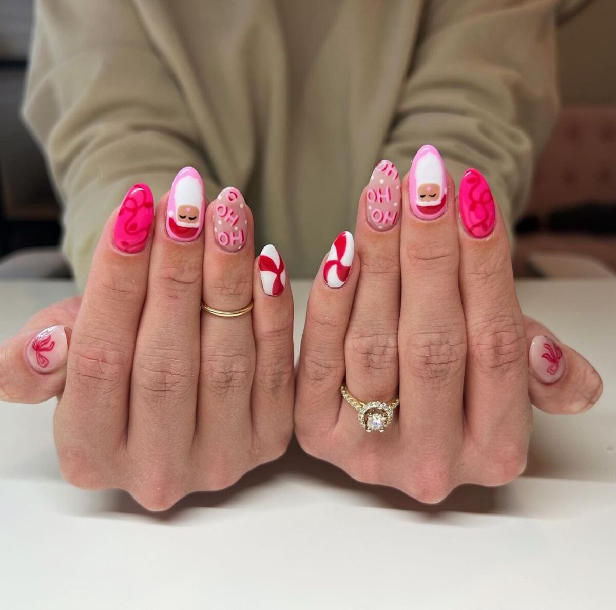 13. Pink Santa and Peppermint Nail Art