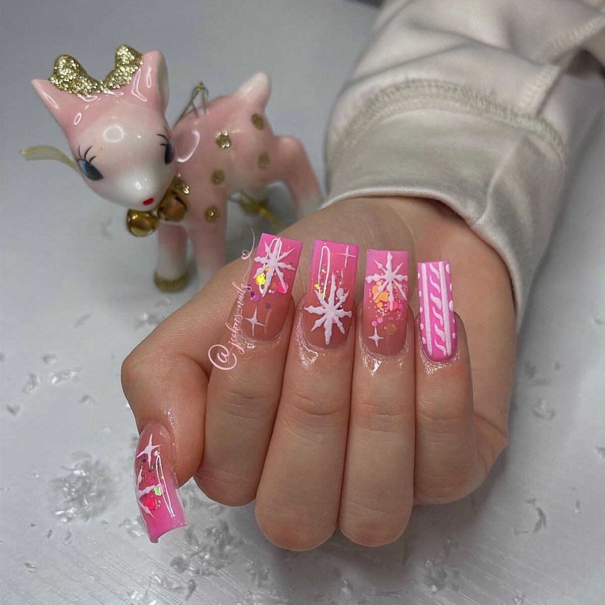 14. Glittery Pink Snowflake Coffin Nails