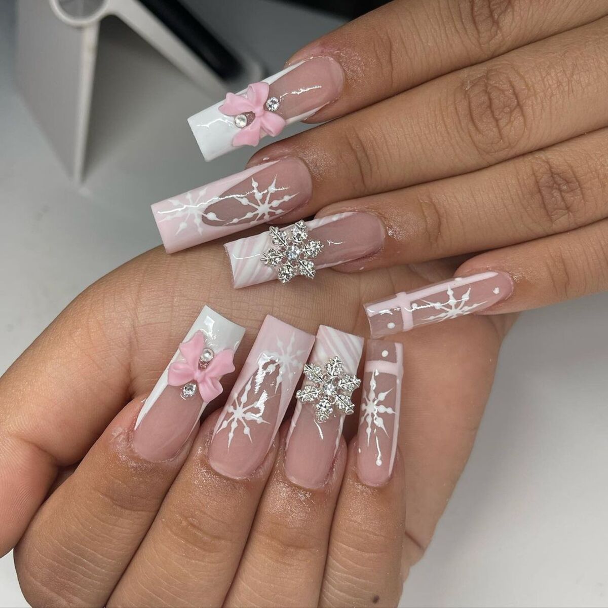 2. Elegant Winter Snowflake Coffin Nails