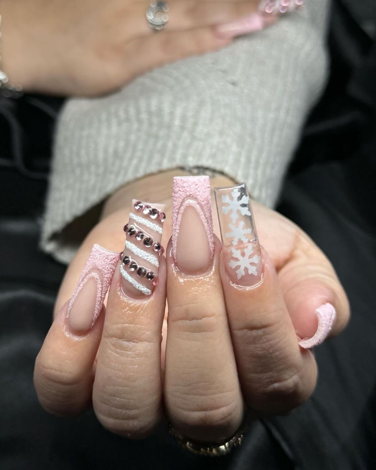 22. Sparkling Snowflake and Rhinestone Accent Nails