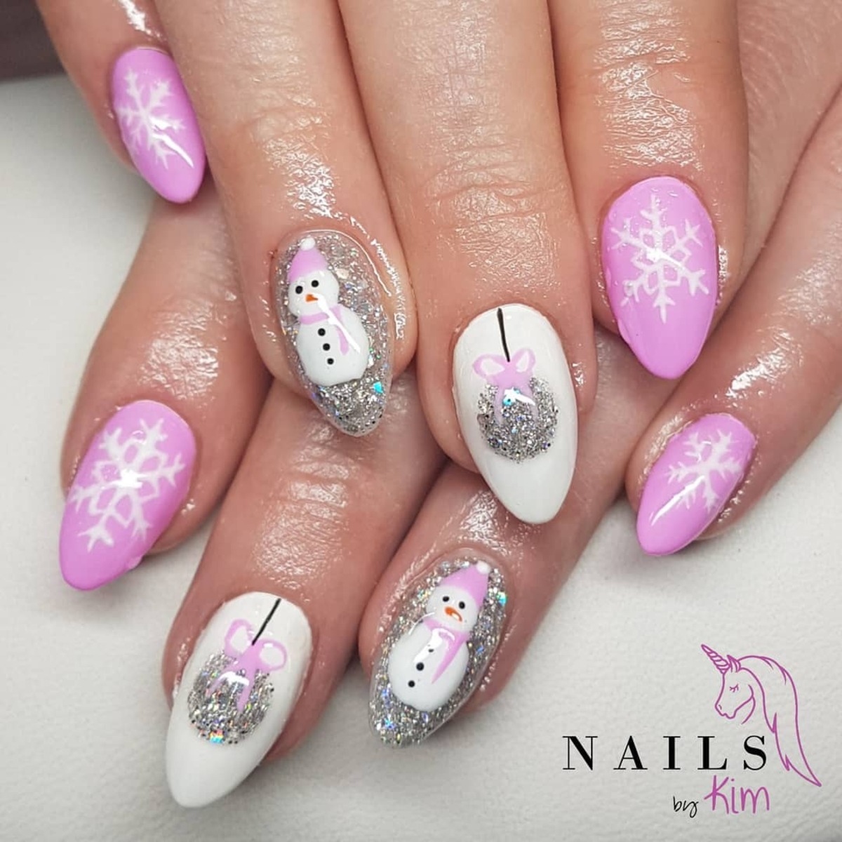 23. Cute Snowman and Snowflake Nail Art