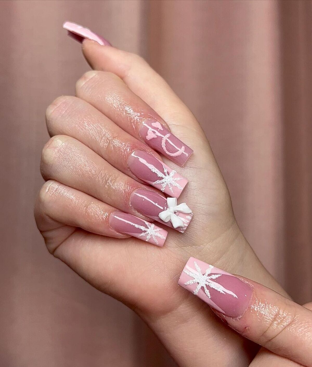 26. Pink Gift-Wrapped Nails with Bows